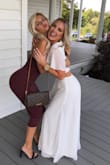 I bought this for my rehearsal dinner. I'm 5'0, so I did have to get it hemmed. I also had the waist brought in a tiny bit. 
I received so many compliments on this dress! It also was my saving grace when my wedding dress was too difficult to dance in - I'm so glad I had this available to change into! Made my whole wedding weekend a dream! Highly recommend. - Katie L.