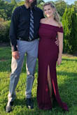 The quality and color of this dress is amazing. The material is a little thicker but has some stretch. I normally would wear a L but sized down based on other reviews. Received many compliments, perfect dress for many occasions. - Shawn F.