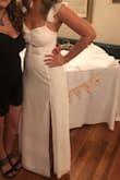 I loved this dress! I wore it for my rehearsal dinner and got so many compliments!  I'm smaller up top and have wider hips and it fit me perfectly! - Kelli S.