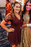 This dress is gorgeous and fits true to size. My only issue with it was that it gaped in the chest. I normally don't have an issue filling out any dresses. I ended up safety pinning the top of the V neck to my bra so that when I leaned forward or bent over that my bra wasn't showing. The zipper was a little uncomfortable when sitting down but beyond that the dress fit well and was very flattering. - Statira W.