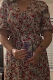 I bought this dress for a formal outdoor wedding. It worked perfectly. I struggled with figuring out the "wrap" part for an embarrassing amount of time. So, if you are also struggling here is what to do. Take the two shorter strings and tie them on the right side of your waist. And then open the right side of the dress and look towards the seam on the inside about waist level and will see a small hole. Take one of the longer strings and thread it through the hole and then wrap the dress and the strings so that they end up tied on the left side. Beautiful dress, very comfortable. - Liz L.