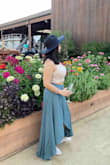 I usually wear a M or L and I tried both sizes. the M was too small, but the L fit well. It was a bit long so it dragged on the floor with my flats. Would be a good length if I wore heels/wedges. It wrinkles easily so I had to iron it before wearing. It's a very cute skirt and comfortable. - Emily C.