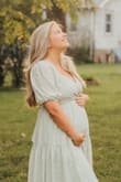 A great dress to show off your baby bump! Loved it so much. - Erin F.