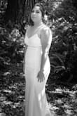 This dress was amazing! Loved it for my wedding. It hugs your body, so be aware of that. Wish I would have bought some shapewear but it was last minute - Misha F.
