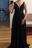 I bought this to be a bridesmaid dress for a formal wedding but the bride thought it looked too similar to another bridesmaid's dress. Sadly I had to return but purchased another Lulus style. It cinches you in without being uncomfortable and the deep-v is very flattering. If you have a chance to buy this dress, do it! - Beatriz K.