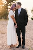 This dress is just as gorgeous as it looks in the pictures with a soft flowy fabric and deep V neckline. I loved the puffed sleeves too. I wore a slip underneath it for more coverage. Such a feminine, pretty dress for an outdoor wedding in late summer. - Kristina C.