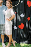 The fabric of this dress is super soft. It really is lovely. I did buy a shapewear slip to wear with it, to avoid the sun shining through it and keep everything smooth, but it isn't 100% necessary. I was actually surprised how comfortable it is. Got it for my engagement party. I highly recommend it. - Nicole M.