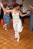 I wore it at my wedding. My seamstress hemmed it a little, fixed the lace, and added a belt and straps but it was worth it! It was so great to change into for the dancing portion of the night. Fits well except for the length hence getting it hemmed. It would have been fine to wear without straps, I was just paranoid. Not see through at all. Great quality. - Victoria L.