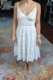 I'm 5'3" and while the dress is pretty, it just didn't look great on me. It made me look shorter. Heels might have been better, but I chose to wear flats with it! - Randi N.