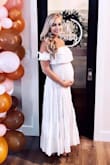 I got my usual size Small and it worked perfect for my shower, being 30 weeks pregnant. Plenty of room in waist and bust. Super comfy and high quality! Going to wear for maternity/newborn pictures most likely, too! Love it! - Lauren M.