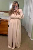 Very beautiful and flattering. Comfortable! Can fit a big bust. Will need hemmed because I'm a shortie but overall love it!
Ordered a medium. - Santana R.
