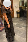 This dress is really pretty. It hugs your curves enough to give you a flattering fit but it's not too tight. The sleeves are a bit loose and kept falling though, and since I'm short it landed at my ankles. But it's perfect for a summer or fall occasion and the subtle details make it stylish and pretty. - Daniela C.