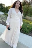 These pictures on the models don't do this dress justice. It is absolutely stunning and gorgeous material WHAT A TIMELESS PIECE!! - Luba K.