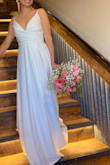 Very simple but elegant....almost made me cry when I tried it on, knew it was the dress... good material, does not look cheap, it just beautiful for the price - Adriana M.