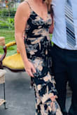 It's a little low cut but good. The strap came loose before I even put it on so I would suggest reinforcing it prior to wearing or bring safety pins. - Andrea B.
