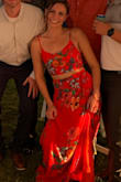Love the design and flow of the dress. Also, you can mix match the top and bottoms too, which I like. The skirt is long for someone who is 5'5"-5'6"which I had expected, but it was fine with the wedges I wore that night. The top is adjustable in the back, but the material doesn't give much and my larger rib cage ended up splitting a small part in the side seam, which is my own fault because I hardly adjusted it when I went from sitting/slouching to standing and dancing and doing the limbo in between. Not as noticeable if you do not wear a bra either because of the design. - Danielle K.