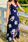 This was such a lovely summer wedding (guest) dress!!! Theres a LOT of fabric, but it was so pretty and so much fun to dance in! It was a little bit big on me in the chest and a little long. But some fashion tape and heels did the trick just fine.
I will warn you though, you should definitely pin the wrapped part (where it opens in the front on the skirt) because you miiiiight accidentally flash someone your spanks if you're up moving/dancing. But for real, this dress is so flowy and romantic and beautiful, I'm obsessed! - Jackie M.
