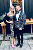 Wore this to a wedding and received so many compliments. The slit looks great standing but is a bit high when sitting. - Stephanie O.