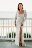 I love this dress! I wish it was hugging my waste more but other than that it was more than I expected. Thought I would have to cut a little shorter because I'm only 5'5 and the model was 5'9, but it came out perfectly with my heels. Got a lot of compliments! Really a gorgeous dress! - Krissy L.