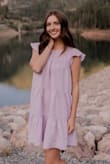 Fits pretty well. I needed a small for my bust, but it's pretty roomy in the waist and hips - size small. Good quality fabric. Such a fun dress to wear! - Teri E.