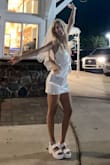 I wore this for my bach party and loved it! I did get it tailored a bit around my waist because I wanted more of an hourglass. Overall perfect and fitted as expected, just tailored it to what I wanted. - Madeline H.