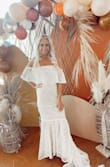 Purchased this for my bridal shower! Got so many compliments it was comfy and fit like a glove, the train was a bit annoying but other than that loved it! - Carly V.