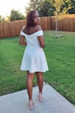The dress arrived on time, was true to size, and well made. It had a lining so no see thru. The fabric was more like a thick tshirt but it was still  beautiful.  Not sure what I thought the fabric would be but didn't think cotton. It was really nice tho - Jewel C.