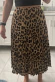 Wow, I am so pleasantly surprised with this skirt! It fits so perfectly and is true to size (I got a small). I ordered it for my dads birthday party and can't wait to wear it!! - Marissa C.