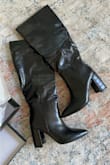 I love these boots and got sooo many compliments on them! They did hurt a bit even after an hour so I recommend breaking them in and getting used to them. I also have bigger calves so I'm trying to stretch that part out a bit as well!! - Sarah J.
