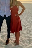 Bought this for a wedding and also brought on my own honeymoon - fits so nicely for those with hourglass/pear shape as the top is fully adjustable. Does take some help to get laced into, and adjust a bit throughout the night. Overall very flattering. Color accurate. - Colleen M.