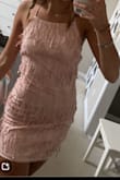 I bought this for homecoming and I love the fit. The little details are so cute. I thought it would be a hit or miss dress and it's definitely a hit. I totally recommend it, you won't regret it!! - Ella L.