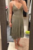 I like the look of this, but it definitely runs small. The suggested size for me was Small & I ordered Small & it barely fits. I can hardly breathe. The back is also very difficult to tie & I feel like I just yank it until it's closed, but then it doesn't look good after. Will try a larger size. - Elizabeth L.