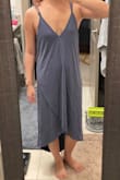 Length is super long for a petite person - It hovers about 2 inches from the floor 5'0" in height. I can only imagine it stretching over time too with the material & straps. It definitely runs large & makes me shapeless. Might try a smaller size. - Elizabeth L.