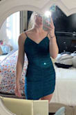 Fits true to size and is a beautiful shimmery color in the sun and in person. Rated 4 stars because the material is a little scratchy. - Lainey P.