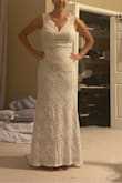 I love the way it fits it has a stretchy fabric and very nice quality, thick material. I normally wear a size medium and almost everything and I felt like this dress was a little tight so it might run a little small - Cynthia S.