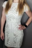 I got so many compliments on this dress! It was comfortable and not too constricting.  I ordered the xsmall per some of the reviews but I felt like if I sat down or tried to drive the dress would split so if you got some curves or are muscular you might want to size up. I exchanged for the small and it gave more room for movement. - Amy W.