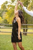I absolutely love this dress! The sequins took on different colors depending on the light.  It was comfortable enough to wear all night even after the dance and wearing heels,  I added a jean jacket and black vans and still felt amazing! - Jennifer Y.