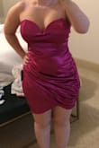 I ordered a small, even though I am a petite and very short person. I have pretty curvaceous hips so I ordered a size down. The fit is absolutely fantastic, the material is thick enough that you don't need to wear a bra, I didn't need to iron it it absolutely just falls right down in place. I wish that it came and more colors because I would absolutely buy it. - Colette S.