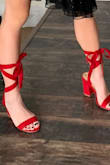 These are beautiful but the front strap is tight around the front of the feet and the ties won't stay up. - Meredith G.