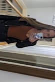 Have this in green too. I love this orange shade it's perfect for fall. Paired also with vegan leather jacket from lulus for perfect fall look. Two buttons that snap securely on bottom, also doesn't ride up your back side. Highly recommend. - Jackie M.
