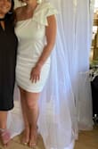 I wore this dress for my bridal shower and I felt very comfortable on a hot day! I didn't want the dress to fit skin tight but I could've ordered a size down because it was loose on me in a large. - Alyssa B.