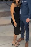 I bought this dress for a wedding. No problems with shipping. Zero complaints. It fits snug but extremely stretchy so really comfortable. It is also pretty thick - it has a second layer underneath. Wore it on a cold day so not sure how hot I would have been if it was warm out. - Raquel L.