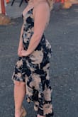 This dress fit me so well and I absolutely loved it. I wore it to a wedding and unfortunately while I was on the dance floor, the floral outer layer completely split down the back seam in a very noticeable way. It's a tighter fitting dress so if you have a large butt (like I do) it may be not good if you plan on dancing at all. - Abby L.