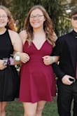 I wore this dress for homecoming and I absolutely LOVEDDD it!! I could actually go down a size, but it worked out for the night. I 100% recommended buying this dress. - Sam D.