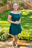 My daughter wore this dress for homecoming.  It was just a little big around her chest but if we had gone to a smaller size that probably would have been too tight through her waist area. The color is fantastic.  The length was perfect. The material has a little bit of stretch and hangs really well. Super cute dress. - Marti M.