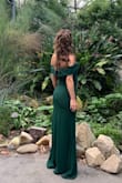 I bought this dress for my engagement and I really loved the off shoulder model and the green color. The dress was long for me (I'm 163cm and wear 8 cm heels in the picture), but the split in the dress made me able to walk easily. The split is not too deep which keeps the dress elegant looking. Sexy, but not too much. ;)

The quality of the zipper could be better& and the size runs a little bit small (keep in mind if you have bigger breasts). Usually I wear size XS, but I didn't fit the XS at all, size S was perfect for me. :) - Bilge K.