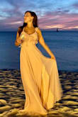 Got this dress for a beach wedding and it was perfect! Got tons of compliments. I'm a 5'8" and 143 pounds and it was slightly loose , but it was perfect, because it was hot and you don't your dress to be tight. - Anastasia B.