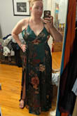 I love this dress! I wore it to an outdoor Fall wedding and got so many compliments. It's very comfortable, lined, and nice quality. The material is soft and buttery. The slit is low enough that the wind didn't reveal everything. You definitely have to wear pasties instead of a bra, but the straps adjust which makes getting the right fit easy. The dress comes pretty long, but with wedges it wasn't too overly long. I'm still going to get this hemmed an inch or so before I wear it next time. But I'd rather have something too long than too short. This dress is very flattering on an hourglass figure, flows nicely, and makes me feel so elegant. Buy it based on your waist and underbust measurements, and it fits perfectly. The color is definitely darker than in Lulu's photos, but it's still really pretty. - Caitlin R.