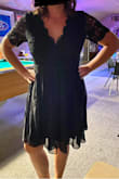 I absolutely LOVED this dress!! Based on reviews I decided to size up to a large and I'm happy I did as there is no stretch in the dress.  I seriously looked and felt like a million bucks!! - Amber K.