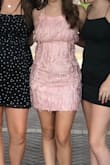 This dress looked lovely on the hanger but even more beautiful on. Lots of compliments! Very unique and one-of-a-kind. Fit almost perfect. The only thing I didn't like was that I couldn't wear a bra and I couldn't tie it tight enough to prevent a "ledge" or "crease" from forming under my chest. That was frustrating but I just tried to stand tall and stick out my chest. Lol. - Melissa G.